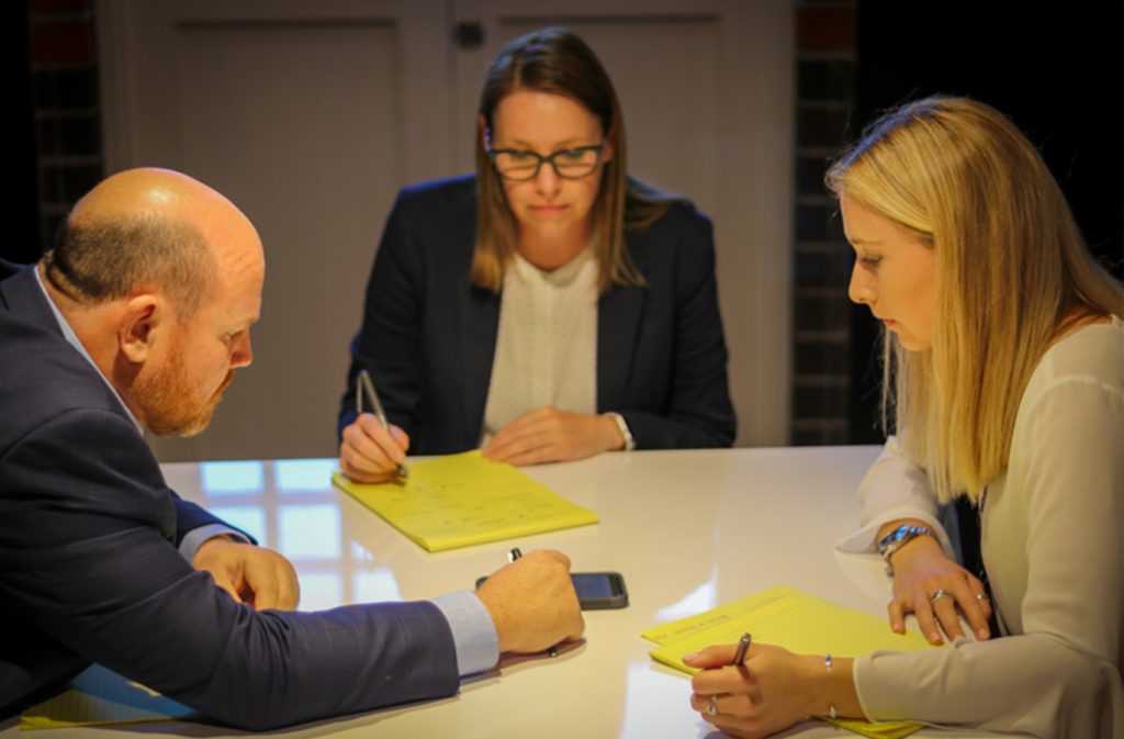 Solicitor and Financial Planner working with client